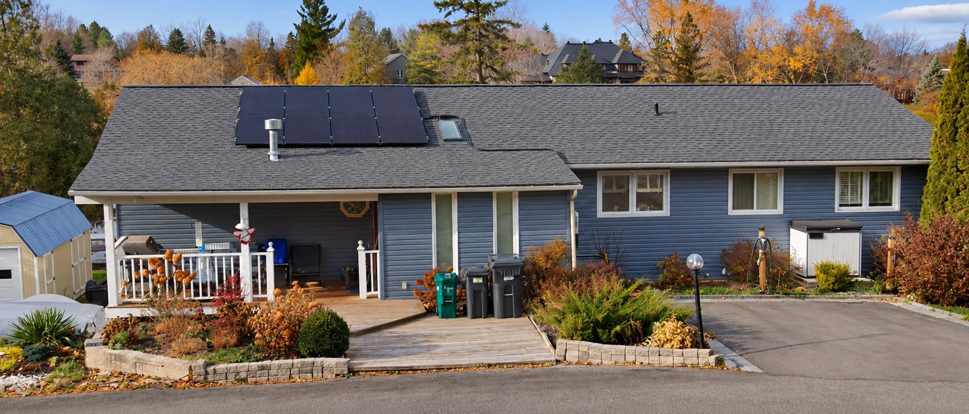 After: house with fresh blue siding