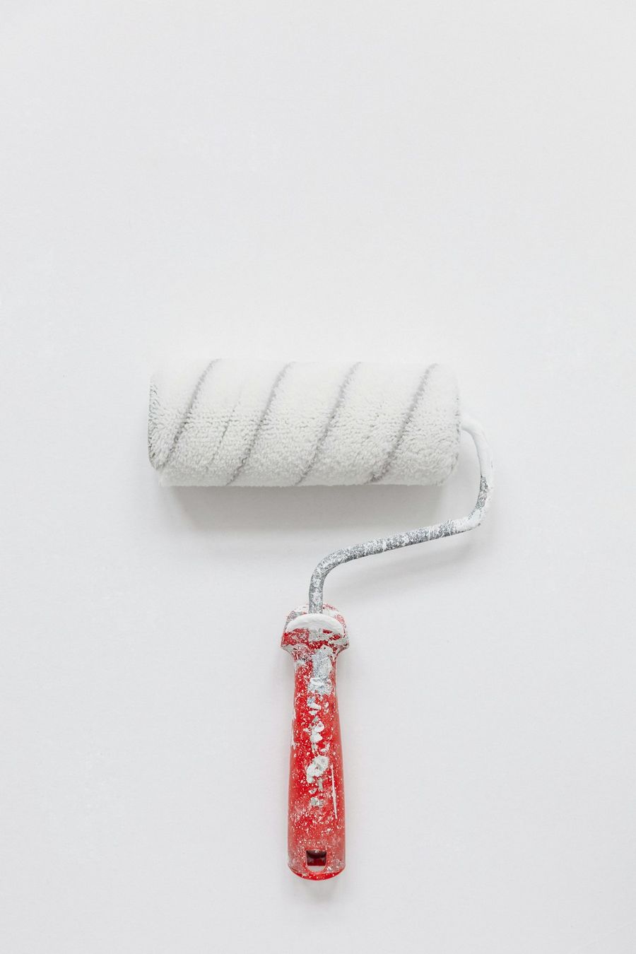 Close-up of a paint roller ready for a fresh coat